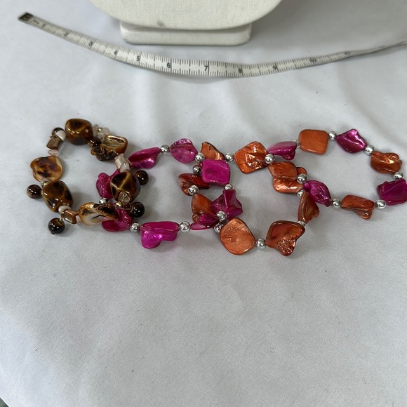 Four stretch shell style bracelets - Picture 1 of 5